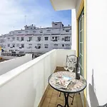 In Center Of *